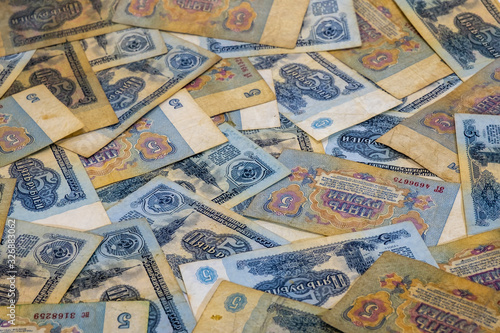 Background from five-ruble banknotes of Soviet money of the 1961 sample.