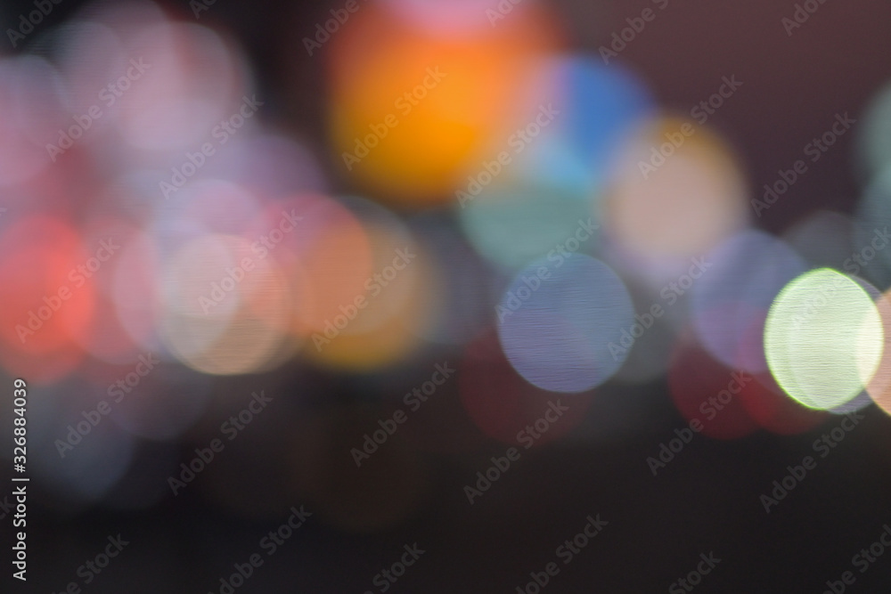background of bokeh abstract colourful red, gold, blue and black glitter lights. defocused background of bokeh abstract colourful red, gold, blue and black glitter lights. defocused