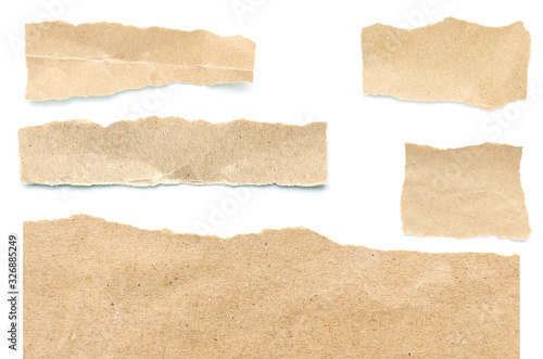 Recycled paper craft stick on a white background. Brown paper torn or ripped pieces of paper isolated on white background.