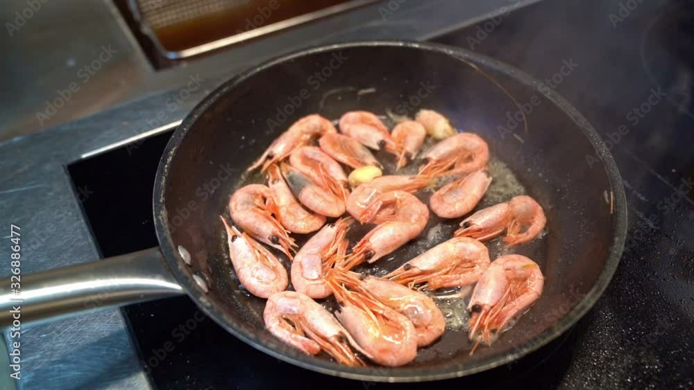 pan fried shrimp. kitchen of the restaurant. top. pan fried shrimp. kitchen of the restaurant. top.