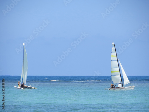 sailing yachts in the Indian Ocean at the equator
