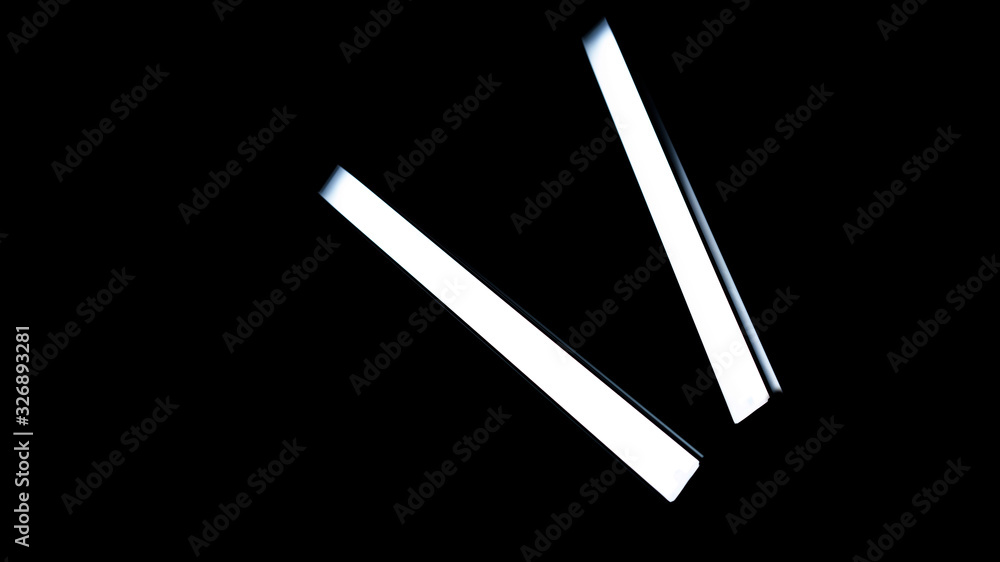 LED lamps on a black background. Studio lighting equipment on a black background. LED lamps on a black background. Studio lighting equipment on a black background.