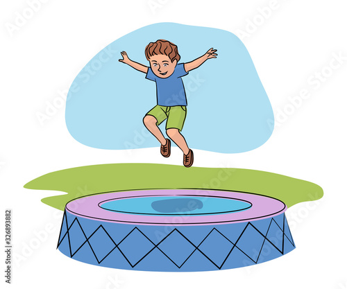 Boy having fun jumping on trampoline