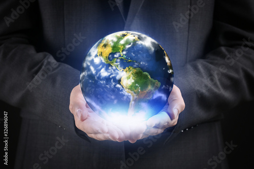 Businessman with model of E...