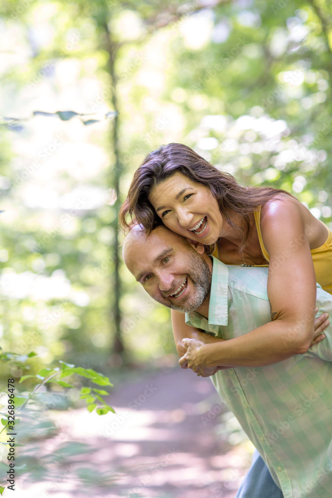 Happy mixed race couple laughing and smiling. Happy mixed race couple laughing and smiling.