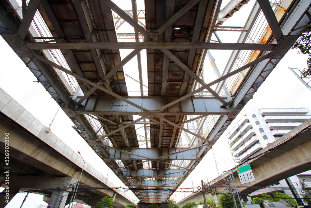 Structural steel bridge,Rama VI Bridge is a railway bridge over the Chao Phraya River in Bangkok,in Thailand,The form of a bridge in the olden days,often with steel structures. Structural steel bridge,Rama VI Bridge is a railway bridge over the Chao Phraya River in Bangkok,in Thailand,The form of a bridge in the olden days,often with steel structures.