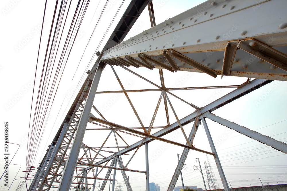 Structural steel bridge,Rama VI Bridge is a railway bridge over the Chao Phraya River in Bangkok,in Thailand,The form of a bridge in the olden days,often with steel structures. Structural steel bridge,Rama VI Bridge is a railway bridge over the Chao Phraya River in Bangkok,in Thailand,The form of a bridge in the olden days,often with steel structures.