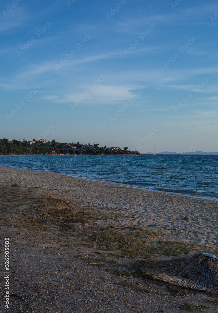 The waterfront of Nikiti in Chalkidiki, Greece, at sunset The waterfront of Nikiti in Chalkidiki, Greece, at sunset