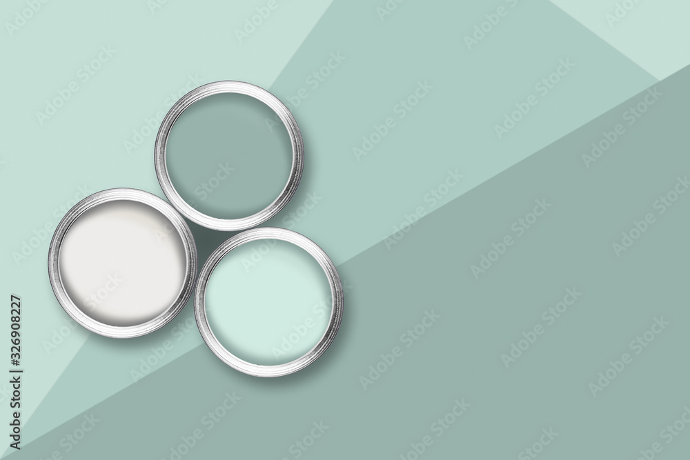 Flat lay picture with three color paint cans on tricolor pastel green background. Flat lay picture with three color paint cans on tricolor pastel green background.