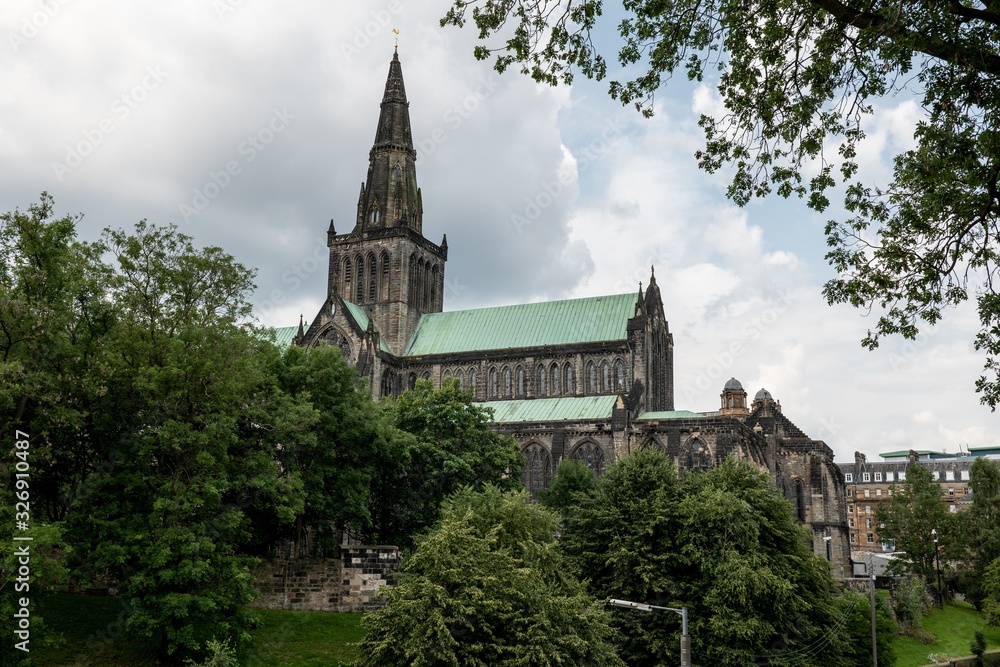 Glasgow Cathedral, also known as High Kirk of Glasgow, St Kentigerns or St Mungos Cathedral behind trees