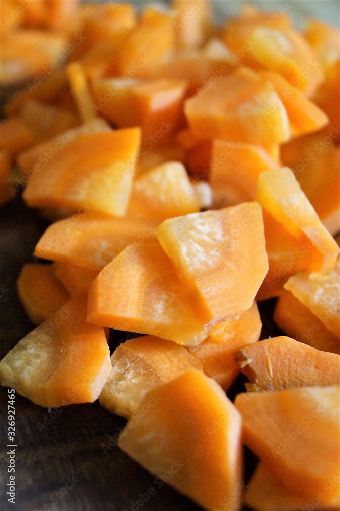 background with orange carrots sliced product vegetable healthy food macro photo background with orange carrots sliced product vegetable healthy food macro photo
