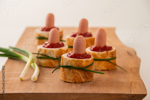 Close up of canapes placed on cutting board