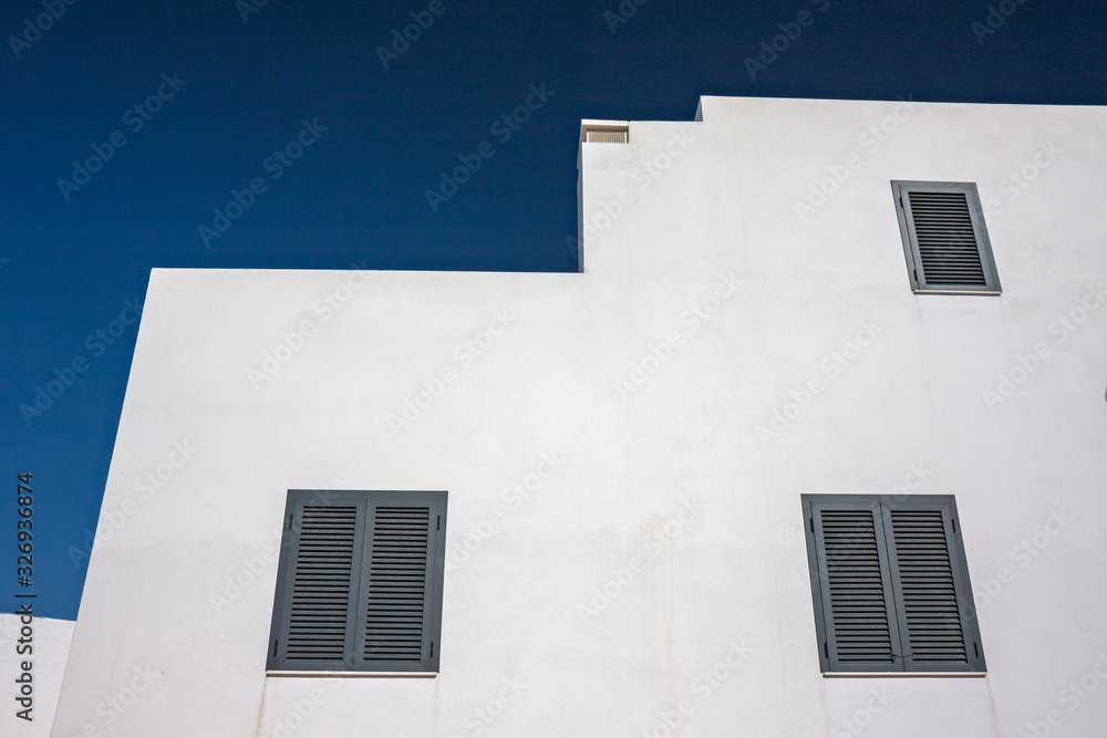 The precise geometries of the sunny, white Spanish houses of the island of Formentera.