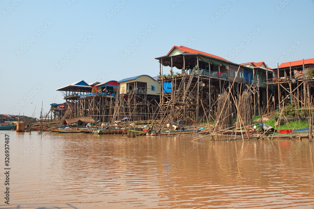 Traveling by boat on Tonle Sap lake along the fishing village Komprongpok