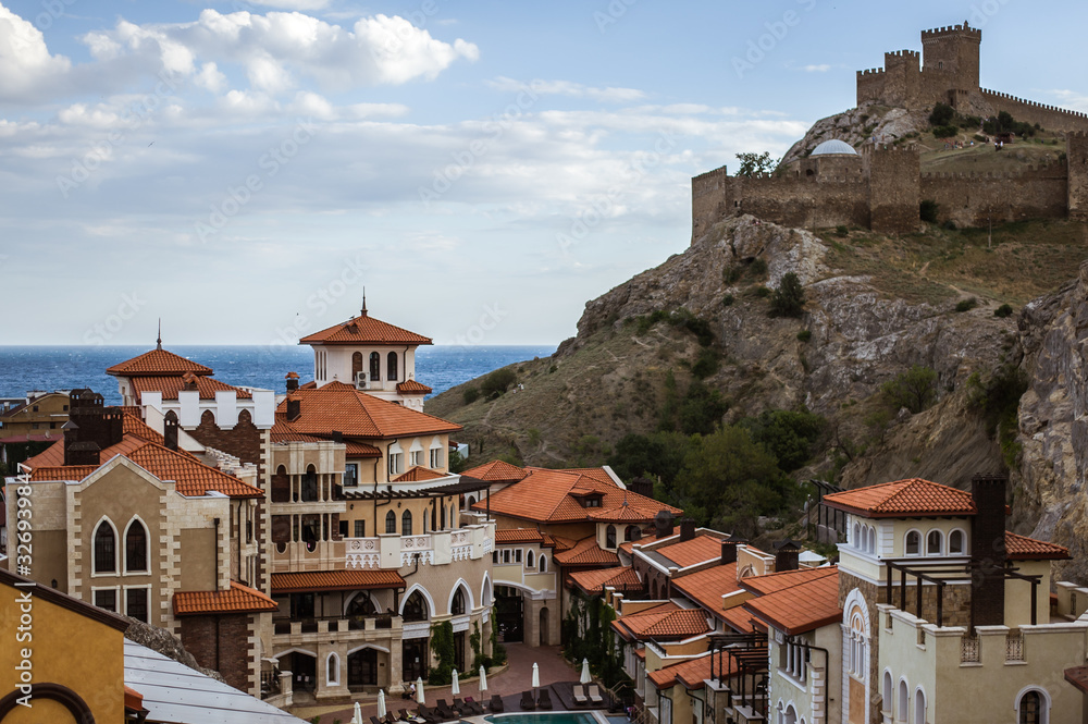 Walls and towers of ancient Genoese fortress in the city of Sudak, Crimea, Russia