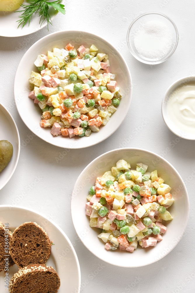 Olivier salad in bowls