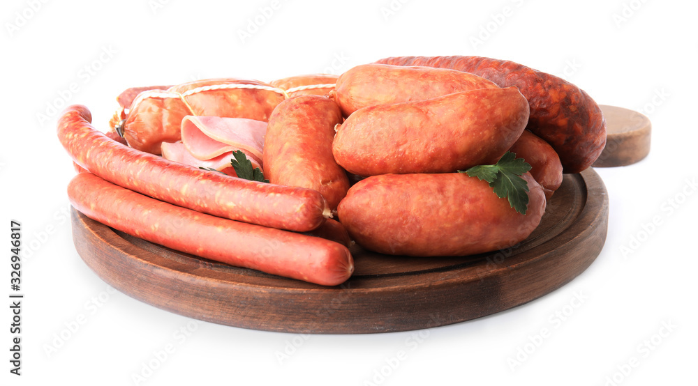 Wooden board with different tasty sausages isolated on white Wooden board with different tasty sausages isolated on white