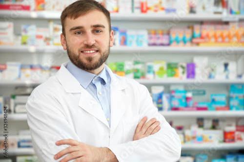 Portrait of professional pharmacist in modern drugstore © New Africa