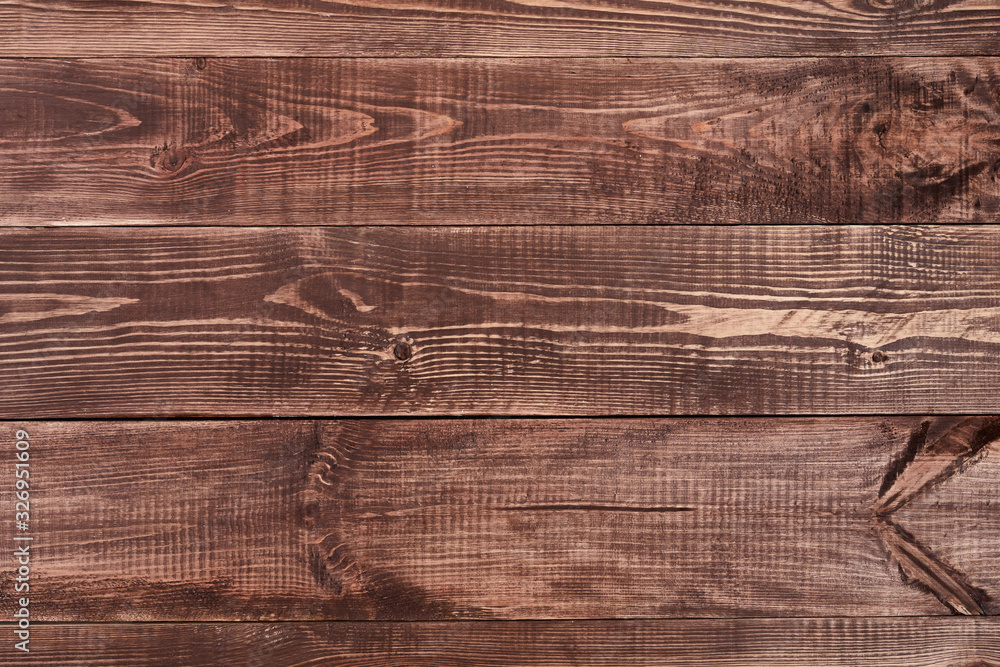 Fototapeta premium close up of wall made of brown wooden planks