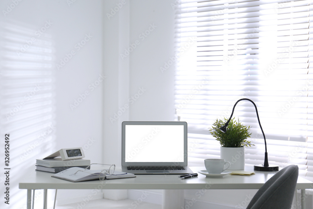 Fototapeta premium Modern laptop on office table. Stylish workplace