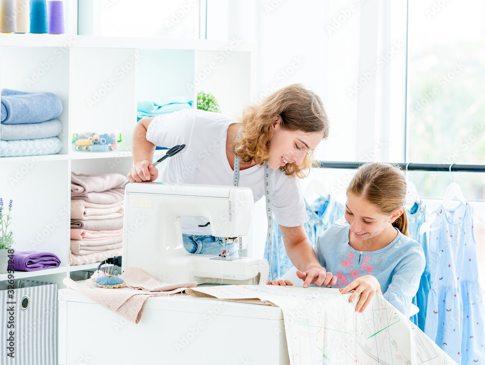 Fototapeta premium Tailor is teaching student