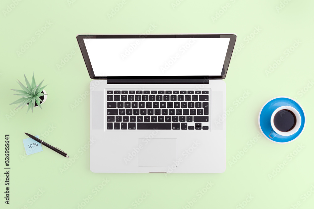 Laptop on workspace. Overhead view. Copy space. Laptop on workspace. Overhead view. Copy space.