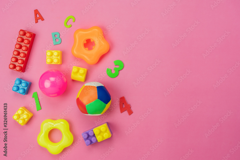 Table top view decoration kid toys for develop background concept.Flat lay accessories baby to play with items child on modern pink paper at office desk.Copy space for add text.pastel tone wallpaper. Table top view decoration kid toys for develop background concept.Flat lay accessories baby to play with items child on modern pink paper at office desk.Copy space for add text.pastel tone wallpaper.
