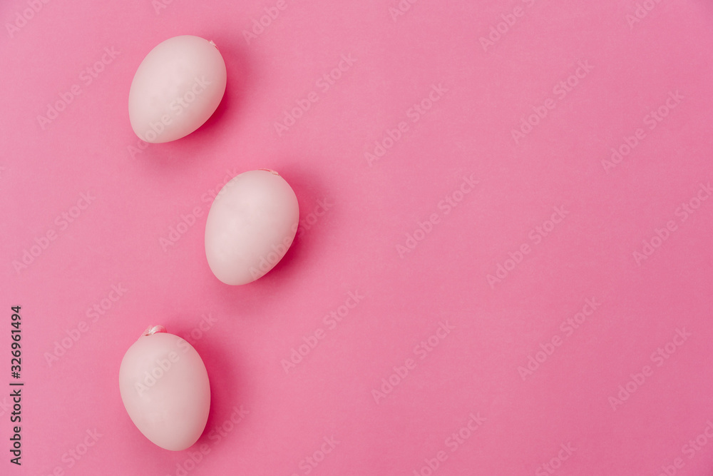 Top view shot of arrangement decorations Happy Easter holiday background concept.Flat lay colorful painting eggs on modern rustic pink paper at office desk.copy space for mock up.
