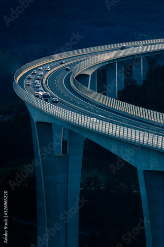 Global transport and logistics connection. Heavy traffic on the modern and futuristic highway.