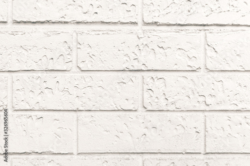 Abstract texture stucco light gray and aged paint white brick wall background. Grungy white blocks of stonework technology. Horizontal architecture wallpaper
