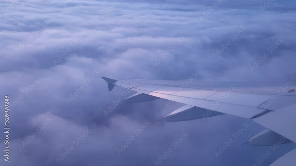 Flying in the cloudy sky with an airliner Flying in the cloudy sky with an airliner