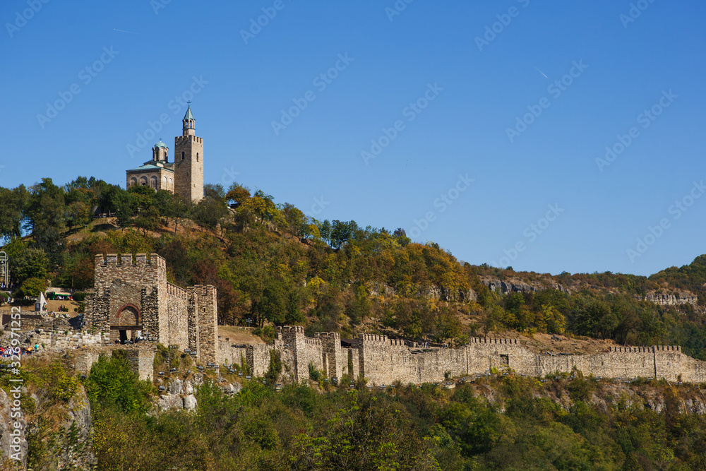 Fortress Tsarevets in Bulgaria, Veliko Tarnovo. Stone walls of an ancient fortress from afar
