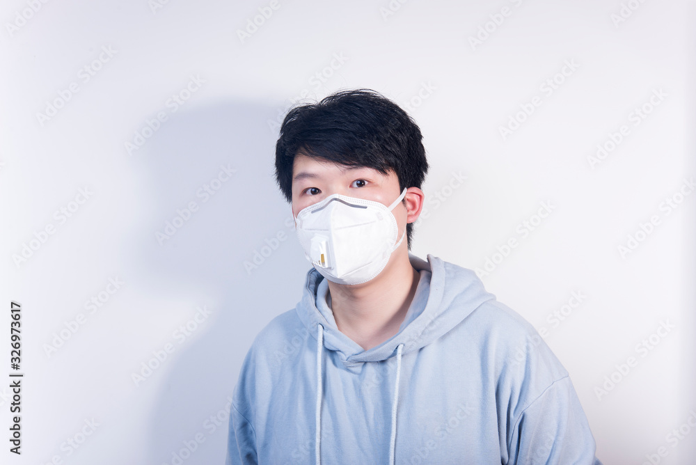 A man wearing a N95 medical protective mask A man wearing a N95 medical protective mask