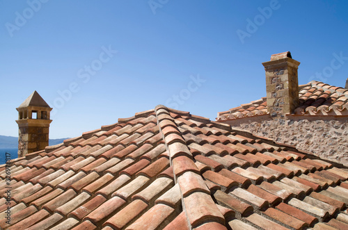 Roofs and chimneys in the old town Monemvasia in Greece © isabela66