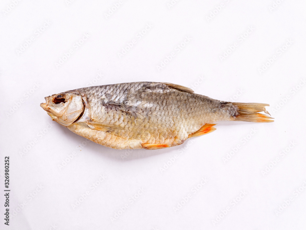 salted dried salted white fish on a white background salted dried salted white fish on a white background