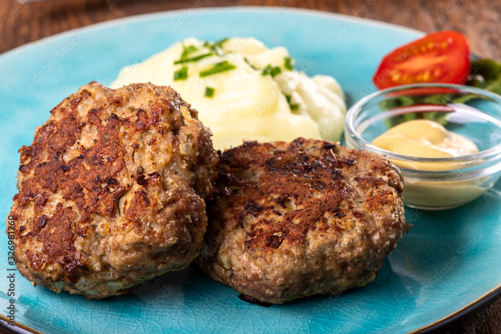 two bavarian meat loafs on a plate two bavarian meat loafs on a plate