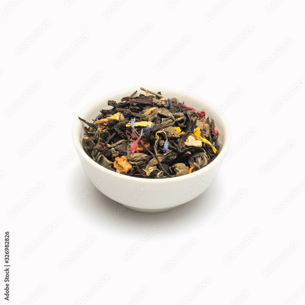 Dried assorted herbs in bowel isolated on white background Dried assorted herbs in bowel isolated on white background