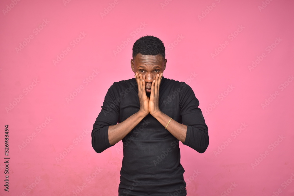 young black man thinking about something young black man thinking about something