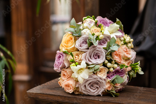 Bouquet of roses on the wooden background  vintage style