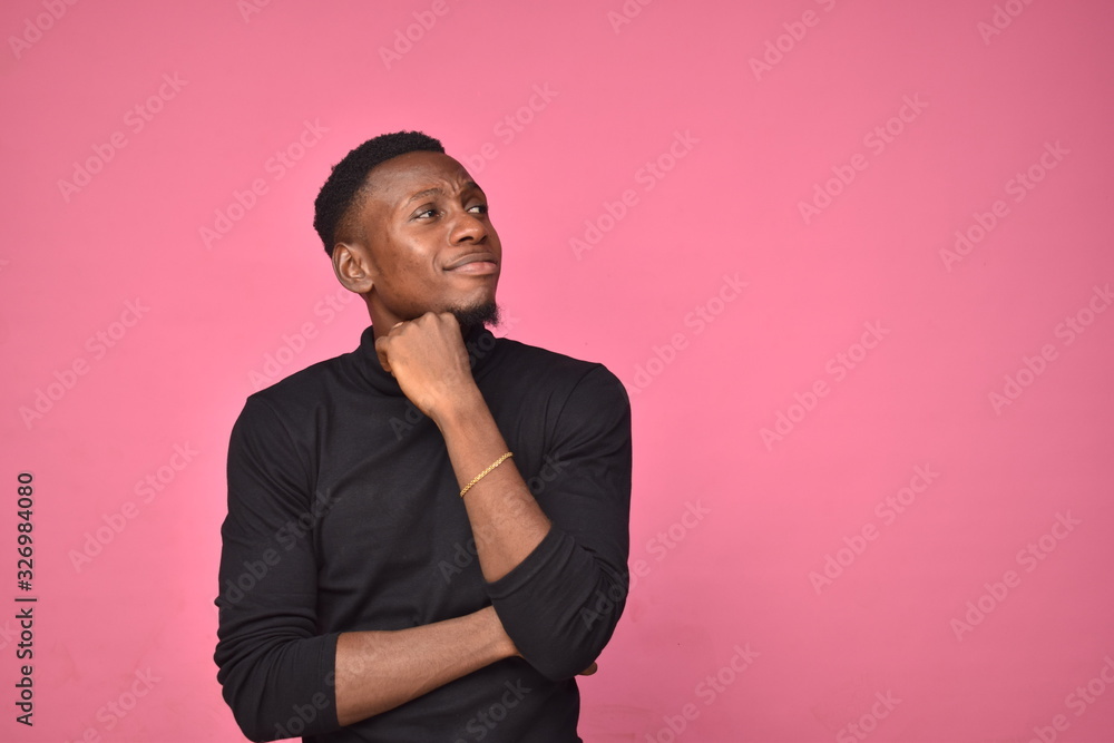 young black man having thoughts, thinking about something young black man having thoughts, thinking about something