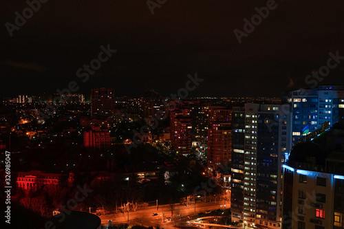Beautiful view of the night city from the skyscraper of the city of Odessa. Space for text © VI Studio