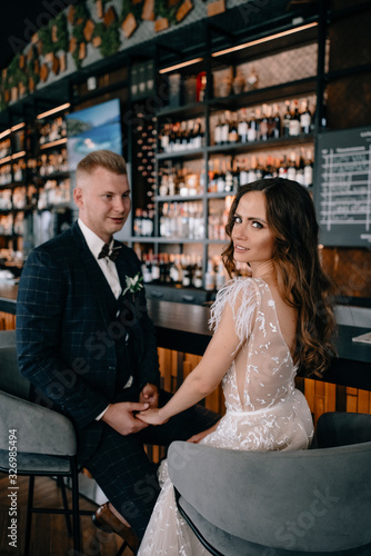 portrait of Gorgeous wedding couple in cafe