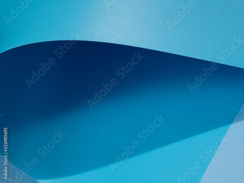 Close-up blue curved sheets of paper