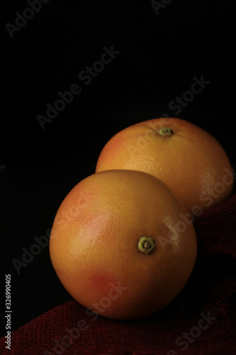 grapefruit close-up shot on a dark background