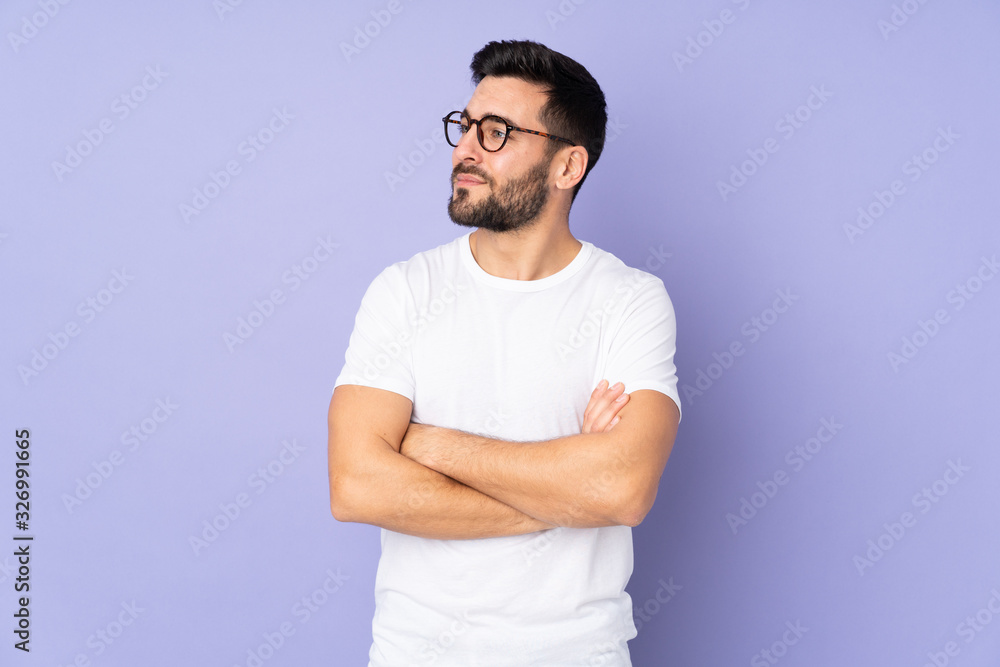 Caucasian handsome man over isolated background looking to the side Caucasian handsome man over isolated background looking to the side