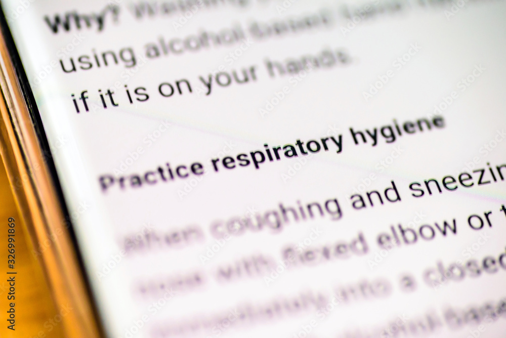 Fototapeta premium practice respiratory hygiene email message on smart phone screen