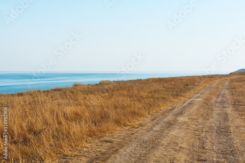 Ground road along sea.  Travel concept