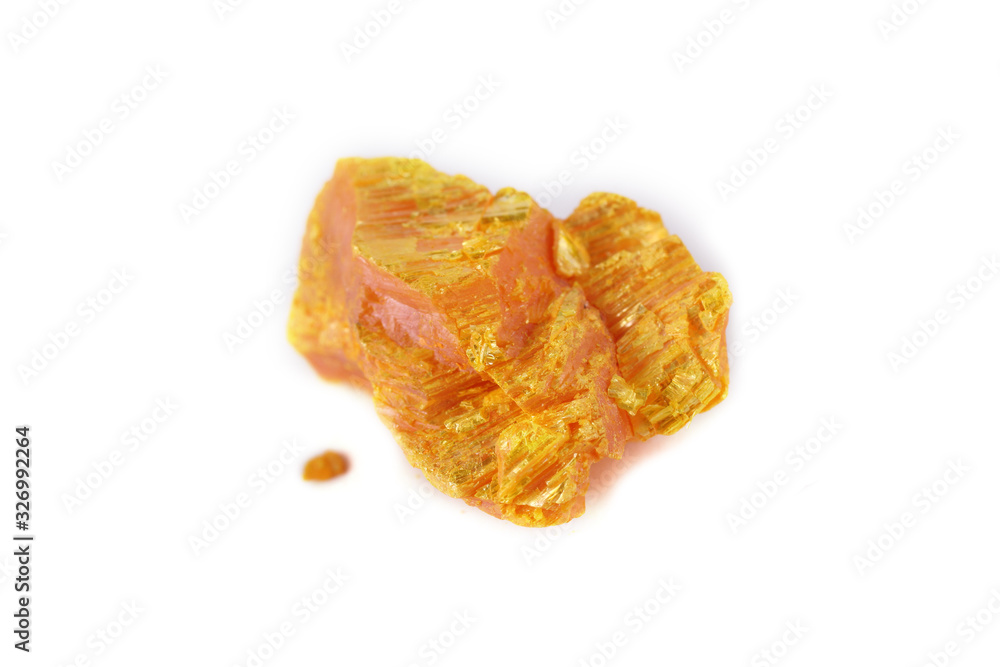 Auripigment (orpiment, arsenic mineral) isolated on white Auripigment (orpiment, arsenic mineral) isolated on white