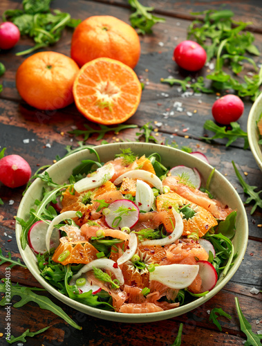 Smoked salmon and fennel salad wild rocket, radishes and sweet clementines