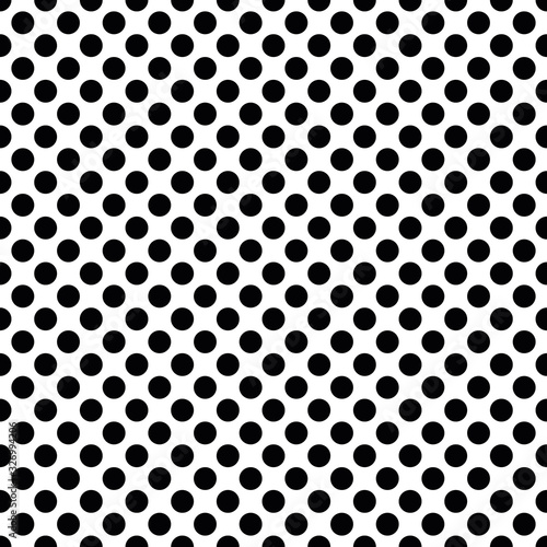 Seamless polka dot pattern in triangular arrangement. Black dots on white background. Vector illustration